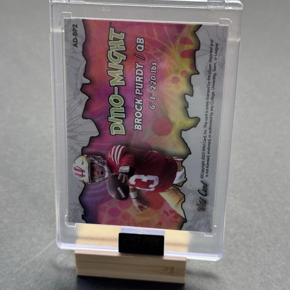 Brock Purdy Dino-Might Illumination‎ Wild Card Football QB Insert Parallel